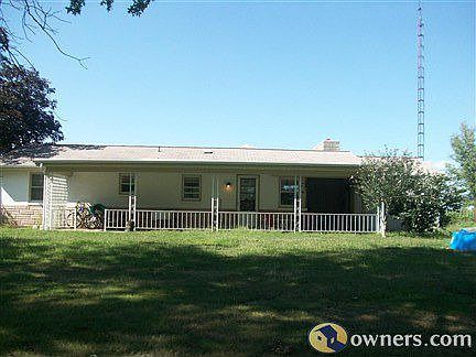 Back of house, white porch.