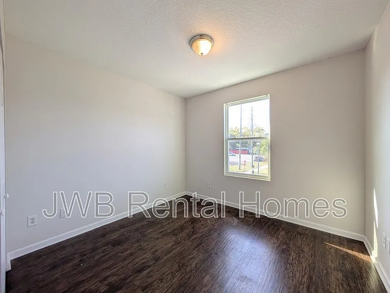 8401 McGirts Village Ln — Photo 10
