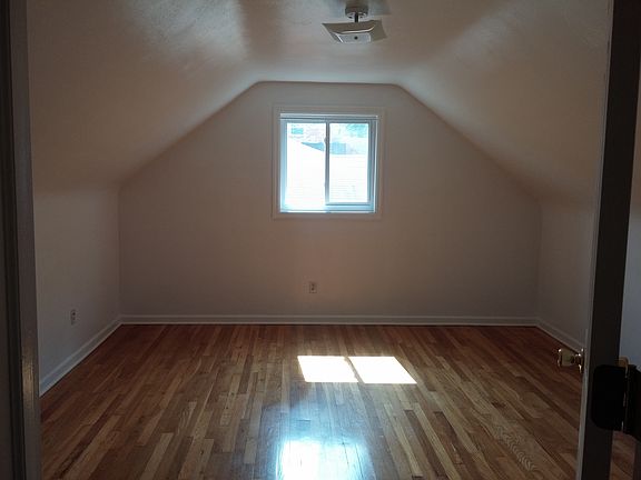 Vaulted ceilings in bedrooms. Refinished hardwood floors!