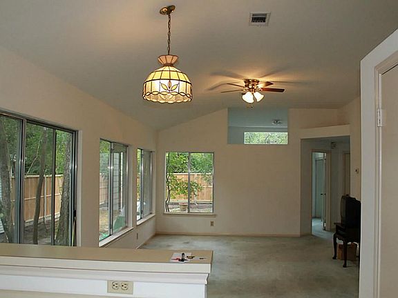 Dining and living space..natural light floods this adorable home.