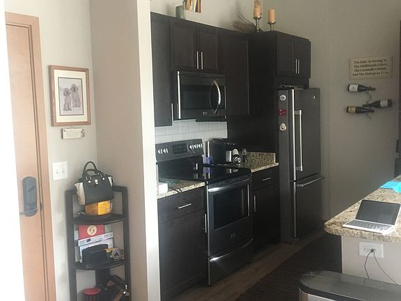 Kitchen granite counters and beautiful cabinets