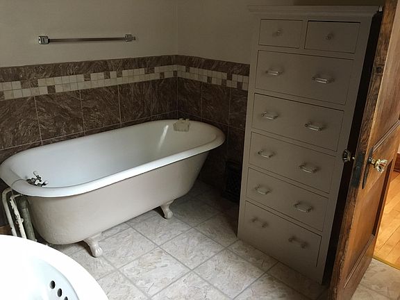 First floor bath with original claw foot tub.