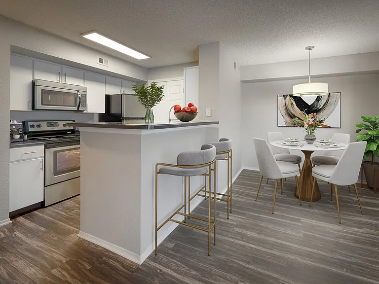 Open concept living and dining areas.