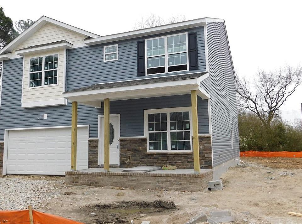 Front Exterior - Stacked Stone Accent. Large Porch