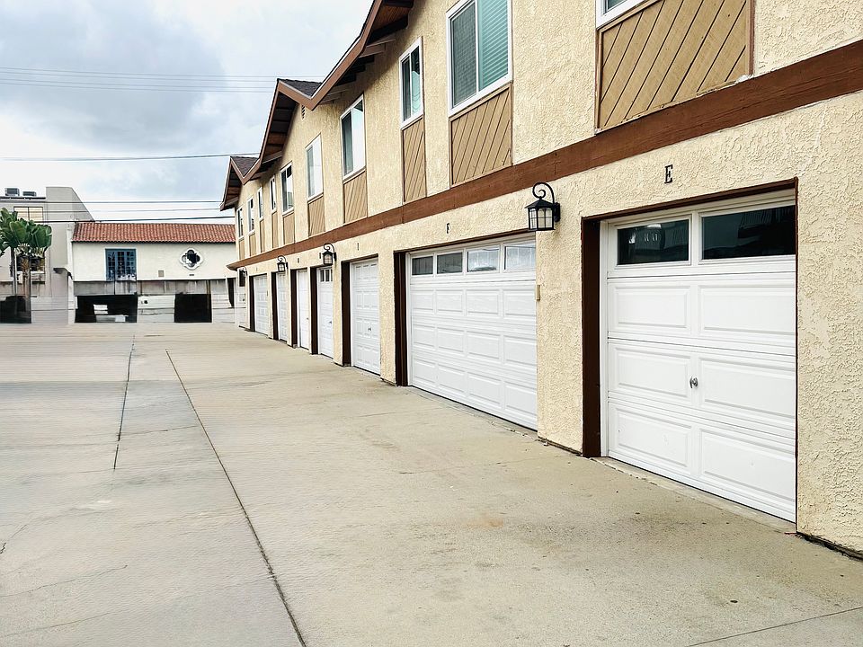 Parking area with detached garage