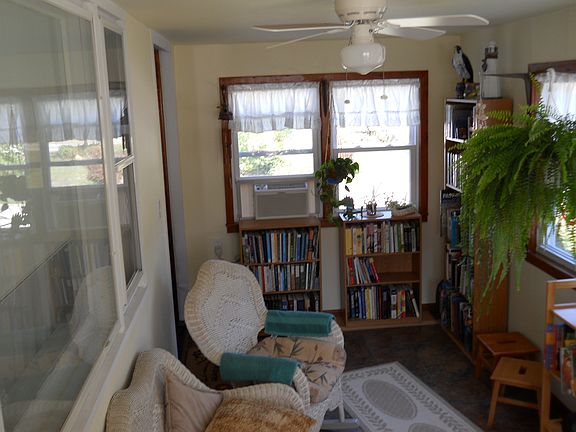 Sunny, enclosed front porch