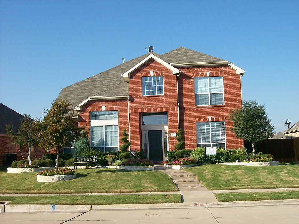 Extensive Lanscaping In Front and Side Yard
