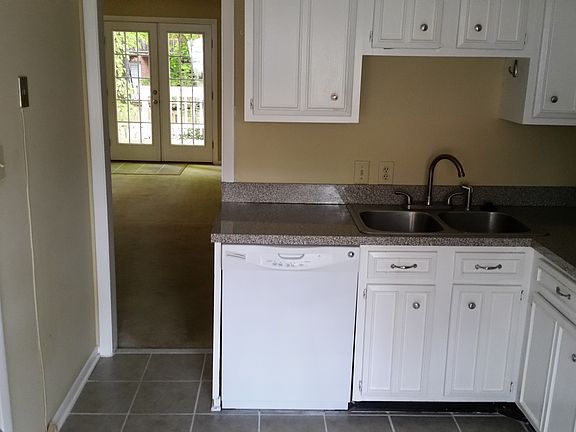 Kitchen leading into living room & dinning room