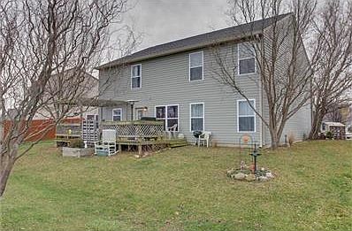 Great back yard with wood deck & pergola.