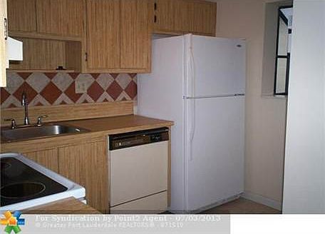 4th image of 303 Gardens Dr APT 202