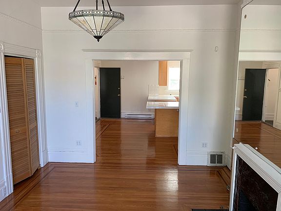 View from living room to large eat-in kitchen area