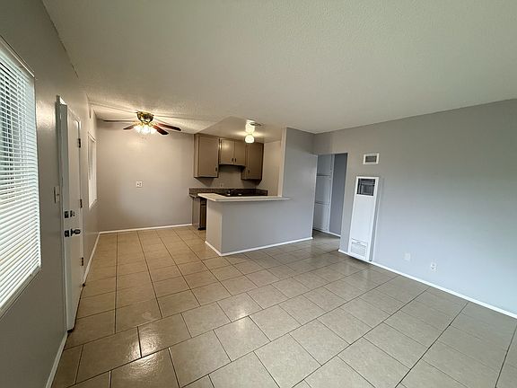 Open concept kitchen and living area with dining area