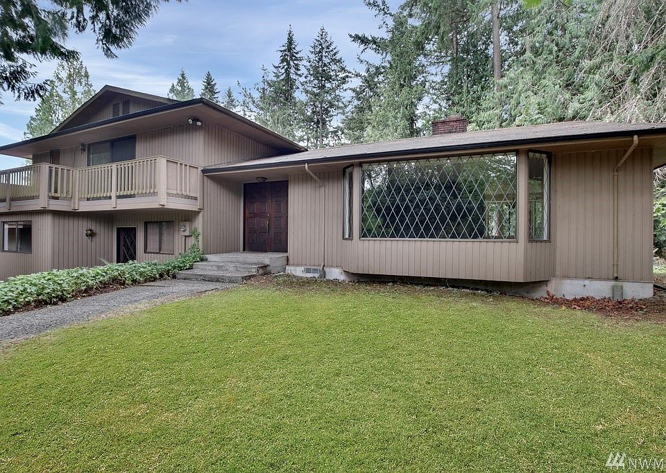 Welcome home to this custom 4 bedroom, 3 bath tri-level on 1.07 acres!
