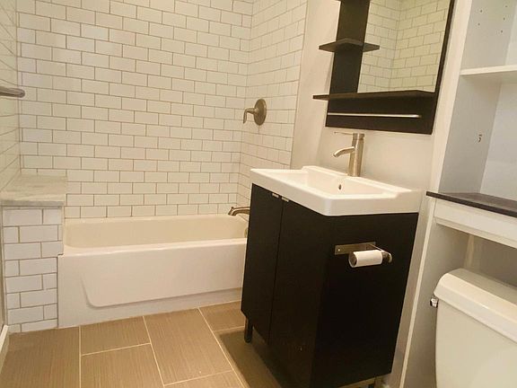 Upgraded subway tile aesthetic in bathroom #2