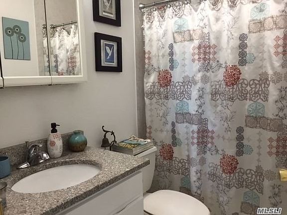 4th image of 213-02 42nd Ave #8E