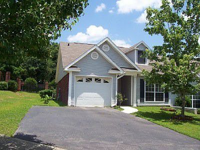 Great end unit with extra parking pad.