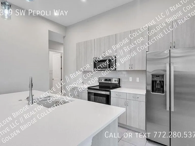 9399 SW Pepoli Way — Photo 3