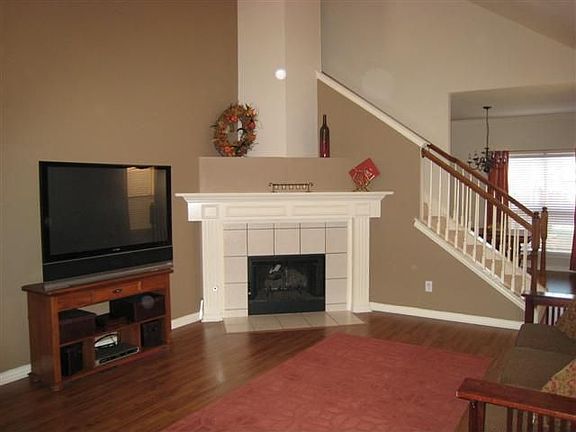 Dramatic fireplace and Pergo Floors