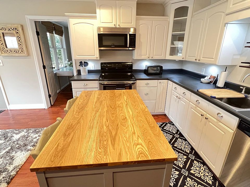 full-size kitchen with full size appliances, cookware, all the basics
