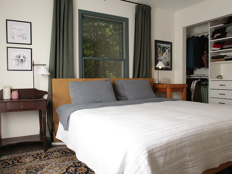 Master bedroom with his and hers closets
