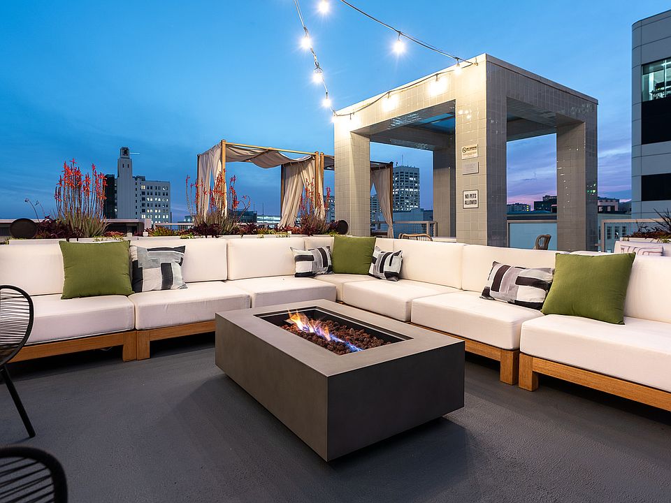 Elevated Elegance: Riva's Rooftop Lounge Area and Fire Feature
