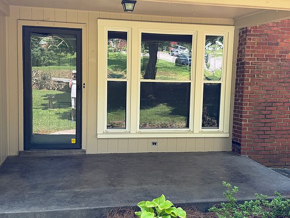 Covered front porch great for morning coffee or shady afternoon hangout