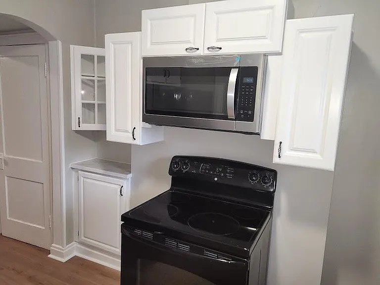 Newly installed remodeled cabinets; new dishwasher, microwave, refrigerator; new luxury vinyl floor; one window with new wide cordless blind