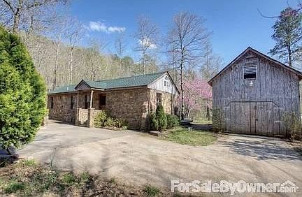 Front Drive and Garage
						:
						Plenty of nicely poured concrete to keep things clean.