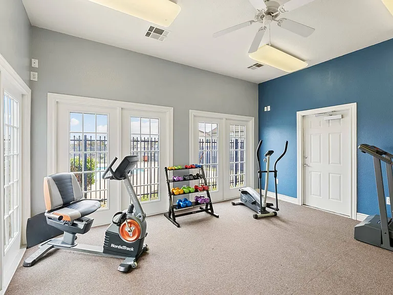 Modern gym facilities at Crescent Village Apartments in Elgin, TX