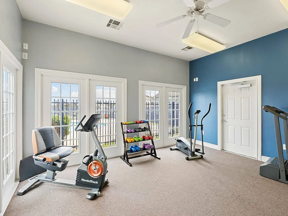 Modern gym facilities at Crescent Village Apartments in Elgin, TX