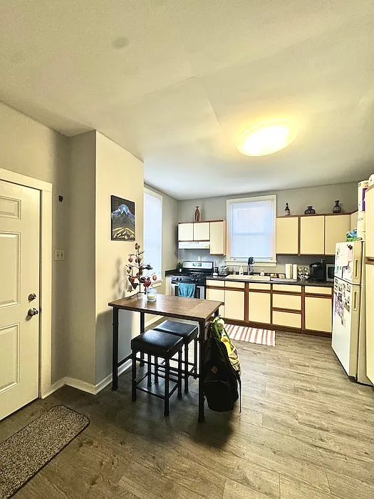 Large, bright kitchen with enough space for a dining table