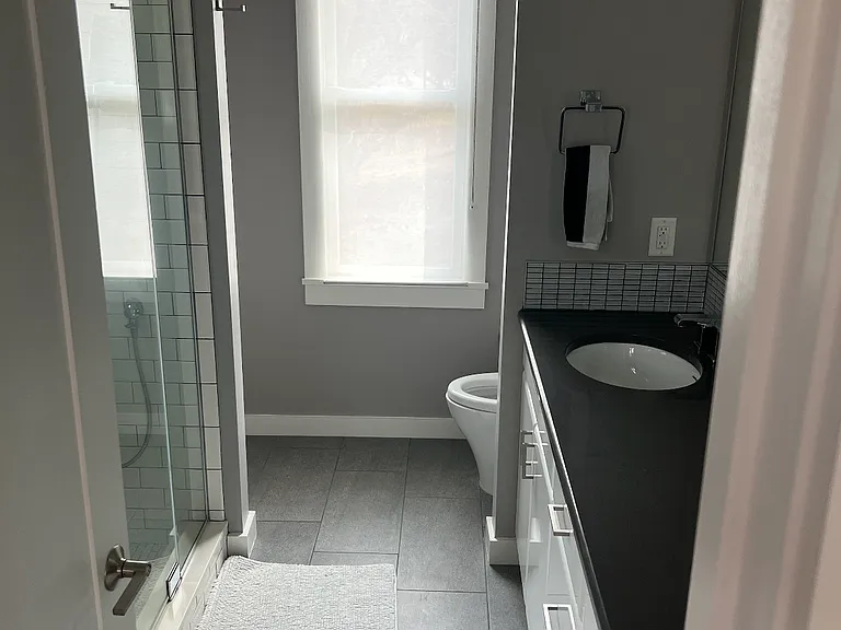 Master bath off of master BR. Larger than photo implies. Two sinks, toilet, large shower, bidet, closet.