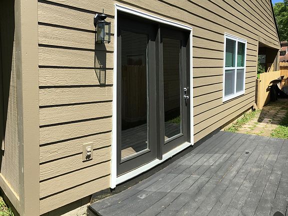 The deck, off from the kitchen and living room, is perfect for grilling out on a summer evening.