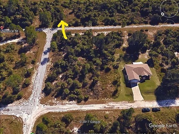 Aerial with nearby house