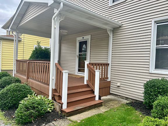 Exterior of house back side large porch