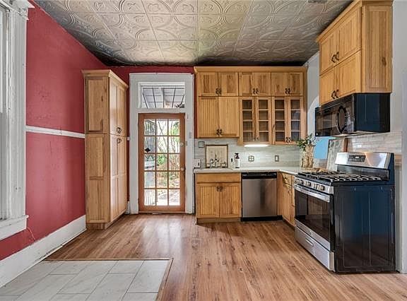 3rd image of 8301-8303 Belfast St