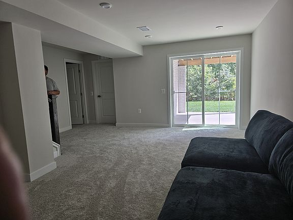Shared den and semi-private entrance. The two doors shown on left are the bedroom and private bathroom.