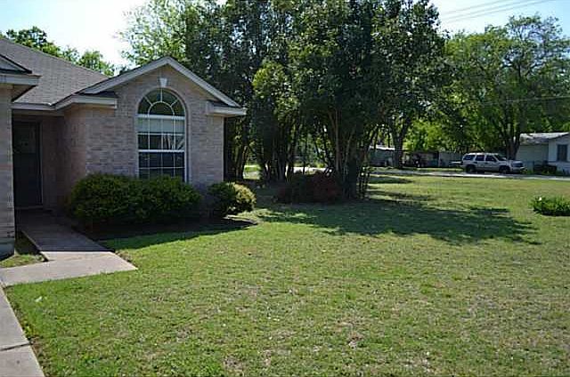 Large corner lot photos taken prior to tenants moving in
