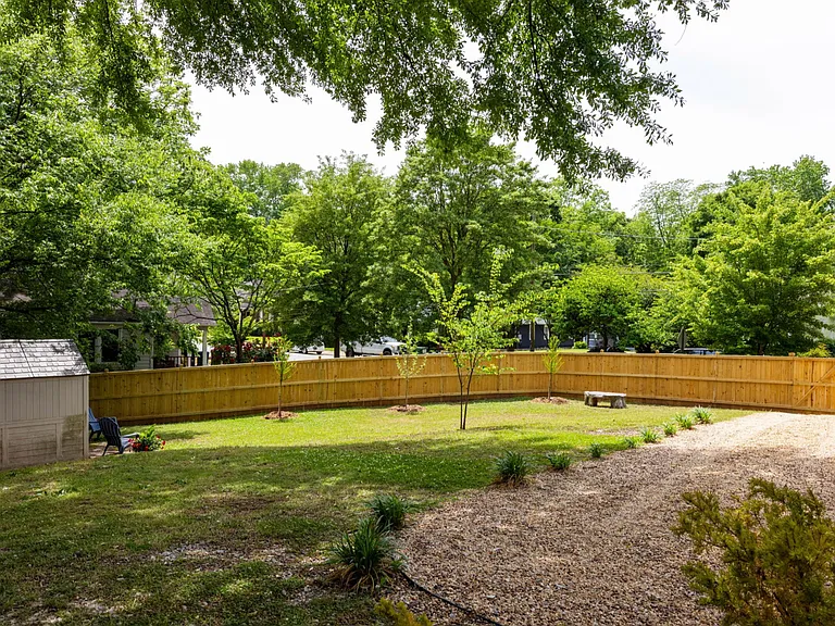 fenced backyard and fence