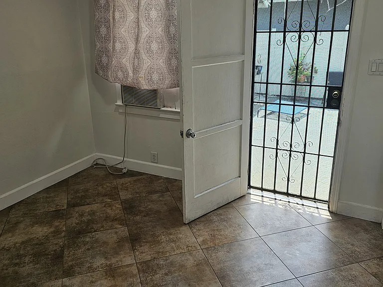 Living Space (view from kitchen, Front door)
