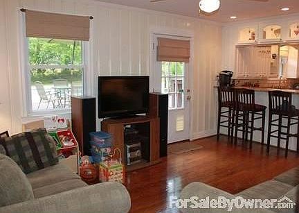 Kitchen opens up to den. : Den overlooks pool and back yard. Great open floorplan!