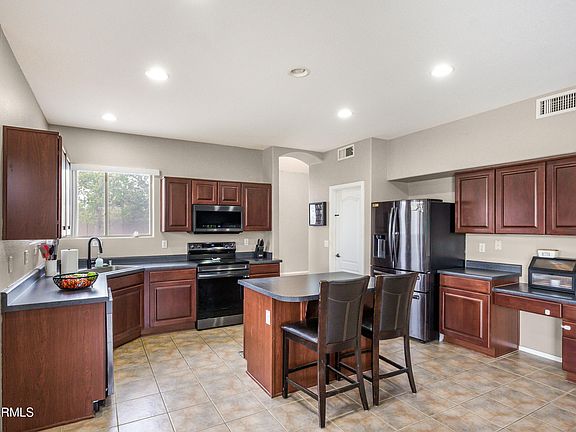 5th image of 13005 W PERSHING Court