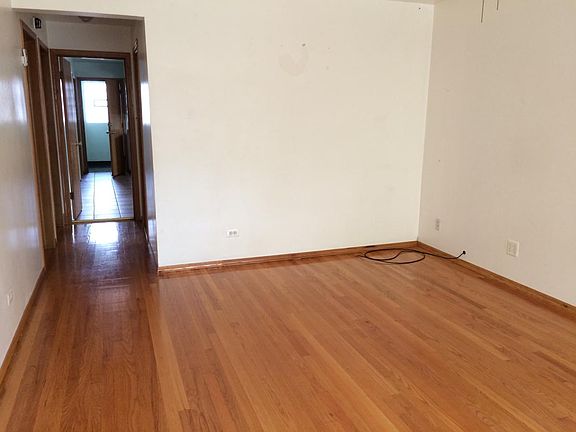 Living room leading to kitchen