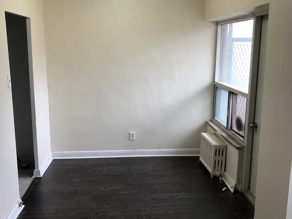 Dining area with balcony access.