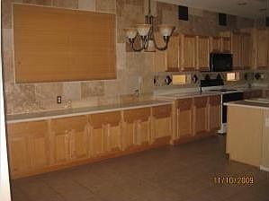 dining area; elevated ceiling, room for table that can seat 12 here!