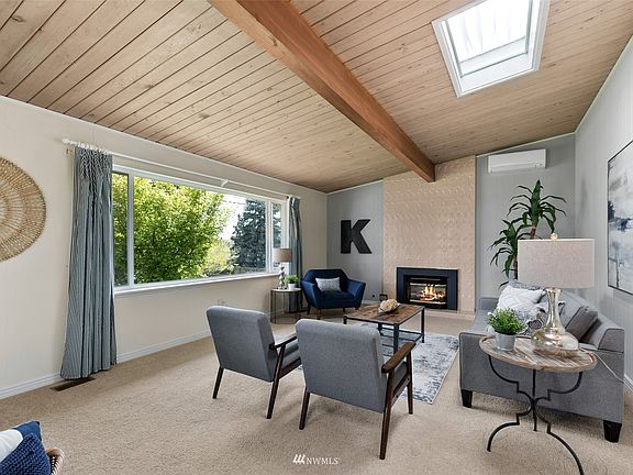 The fireplace, beamed tongue & groove ceiling just add so much character to this already great home. 