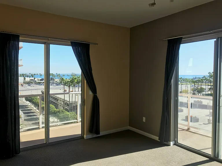 Living Room / Kitchen View - Beach and Harbor