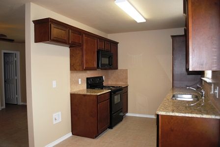 Kitchen with granite countertops