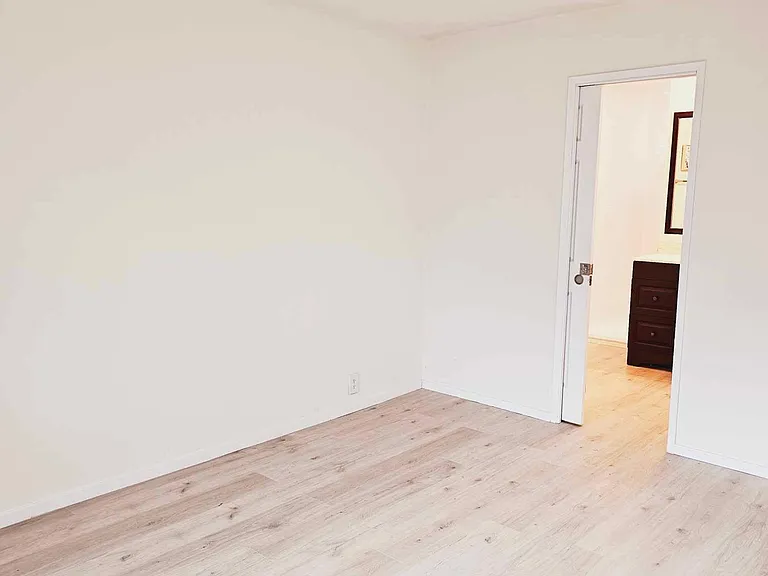 Bright and sunny Master bedroom. Pocket door for space-saving in Master bath suite