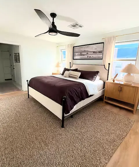 Master Bedroom with exterior door leading to back patio/Hot tub